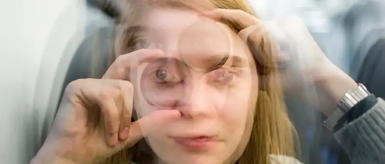 blurred woman with glasses