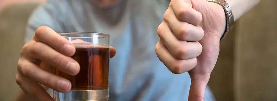 man giving the thumbs down