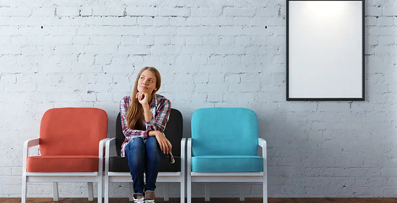 Thoughtful woman room with frame