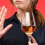 woman refusing wine