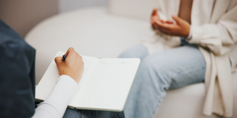 psychologist writing patient with anxiety hands help sharing